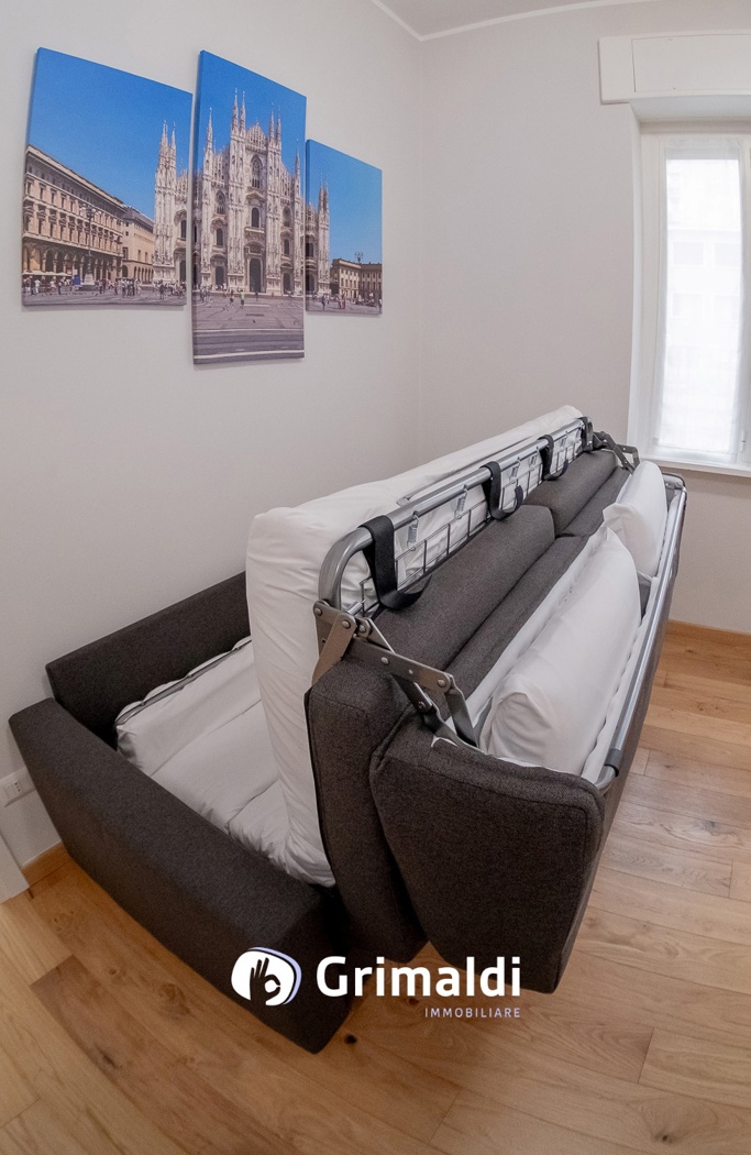 Troverete i cuscini negli appositi contenitori situati nello schienale del divano-letto.jpg