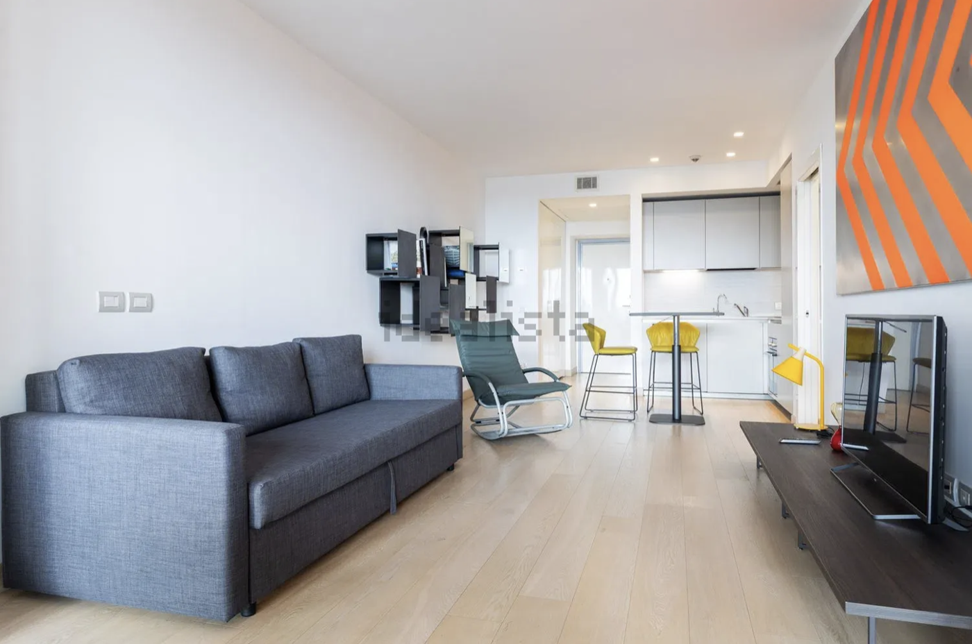 SOGGIORNO CON CUCINA A VISTA E TERRAZZO