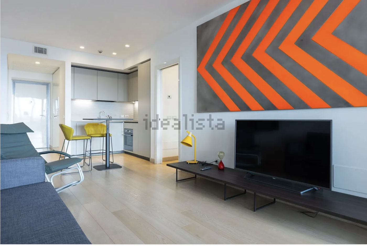 SOGGIORNO CON CUCINA A VISTA E TERRAZZO