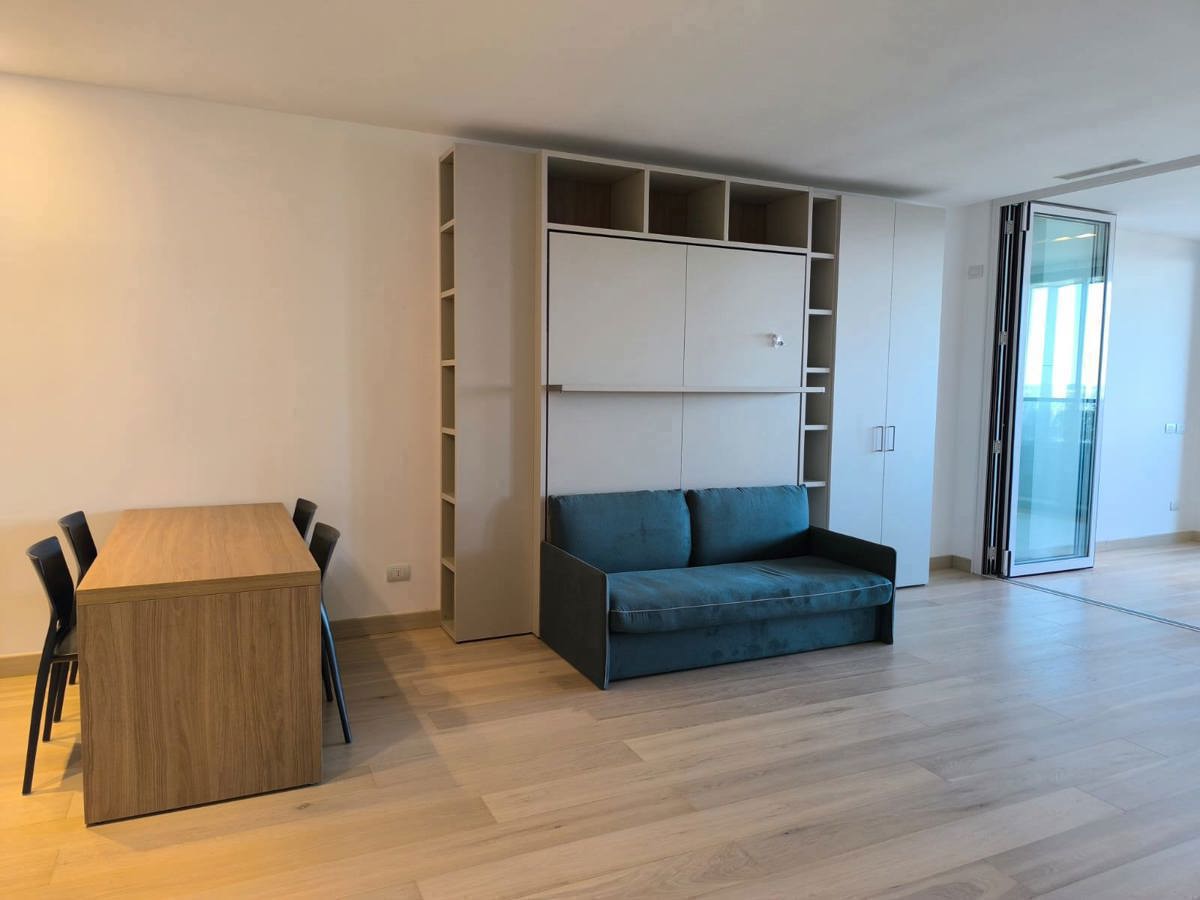 SALONE CON DIVANO E LETTO A SCOMPARSA