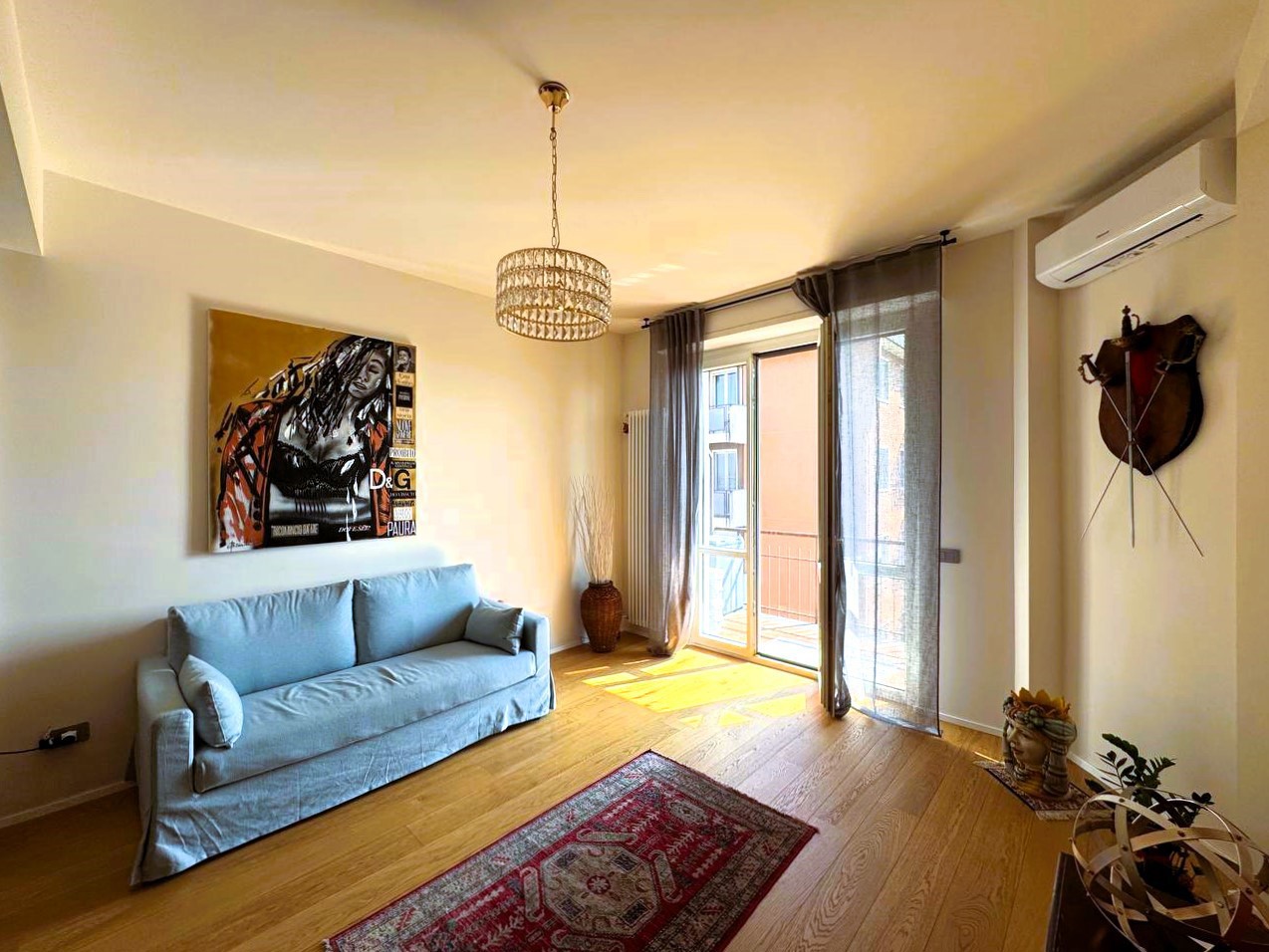 Soggiorno con cucina a vista
