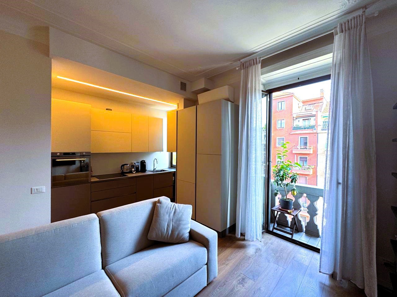 Soggiorno con cucina a vista