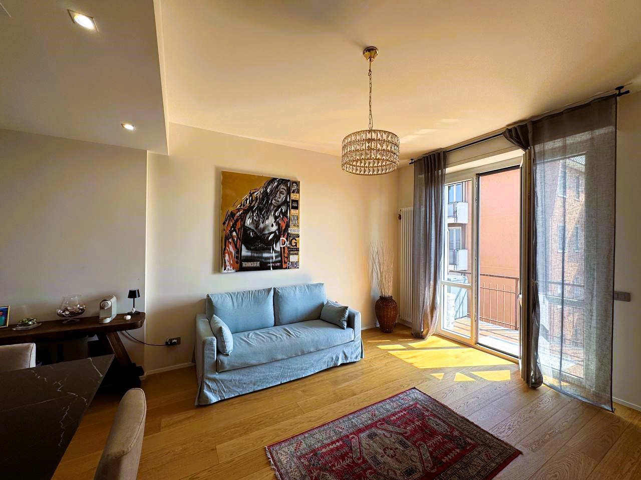 Soggiorno con cucina a vista
