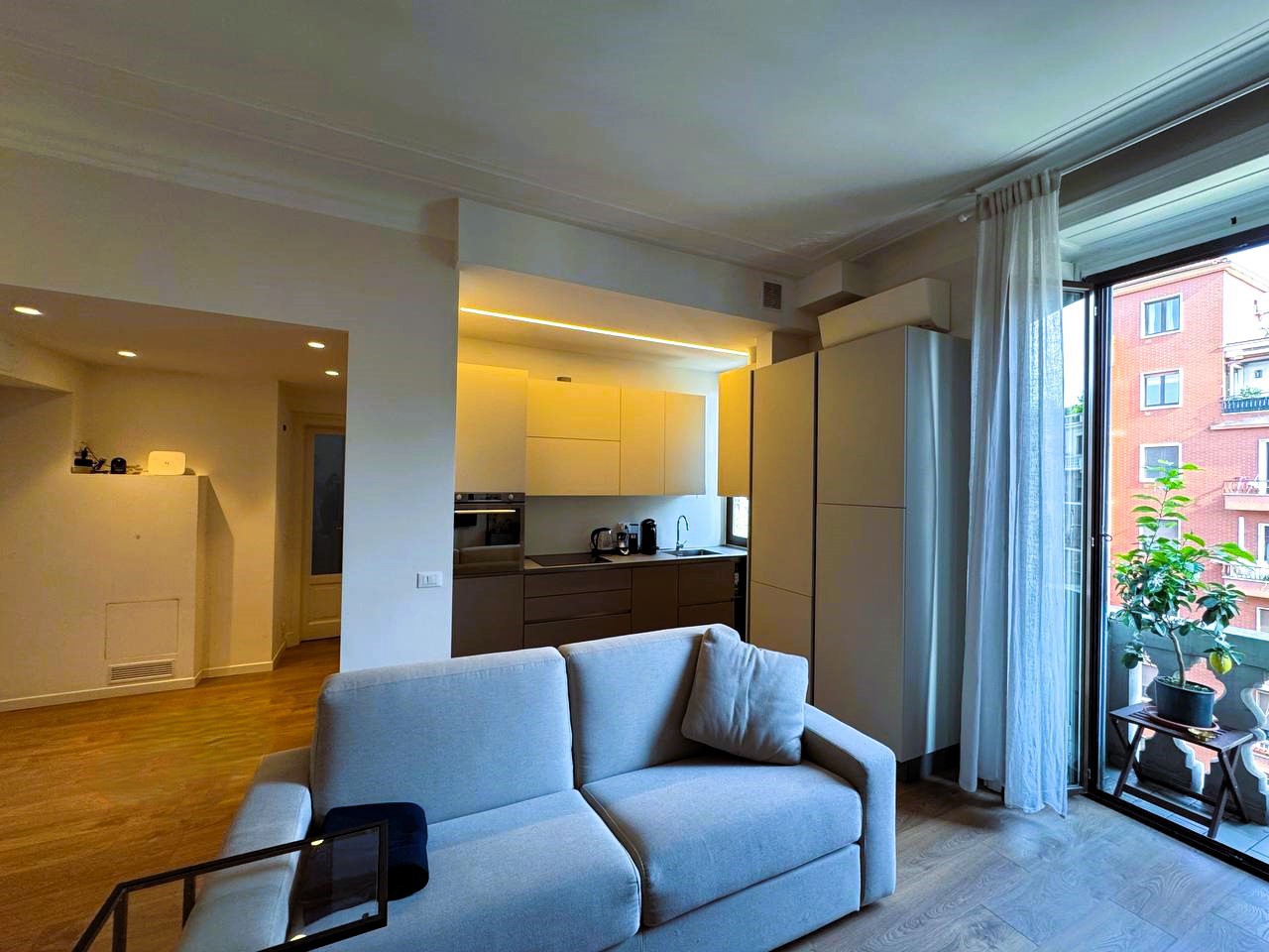 Soggiorno con cucina a vista
