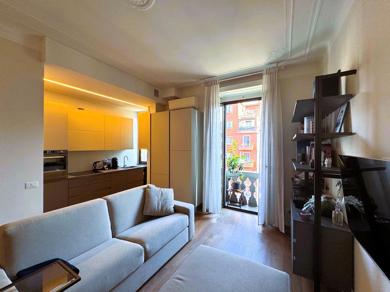 Soggiorno con cucina a vista