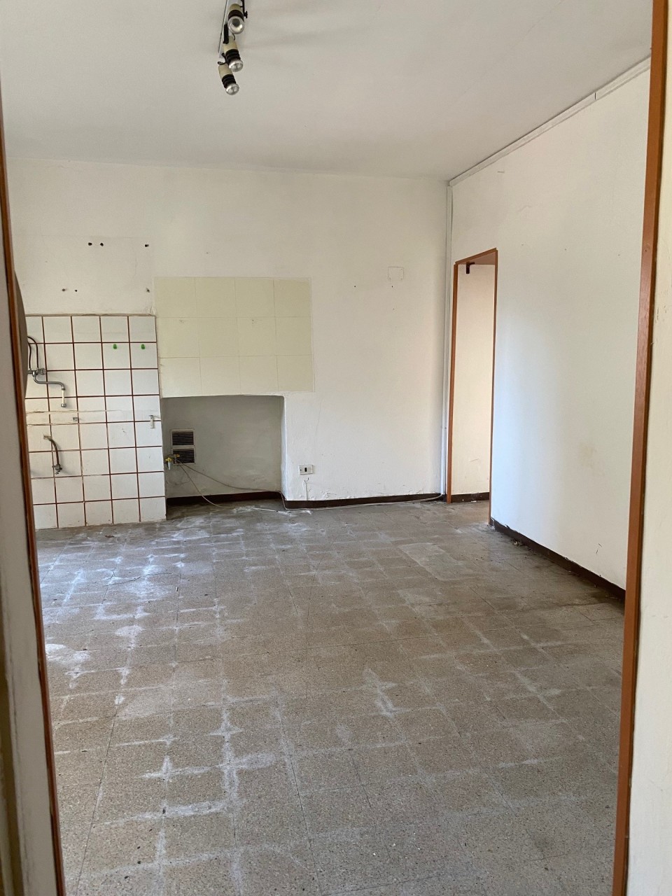 Zona giorno con cucina a vista