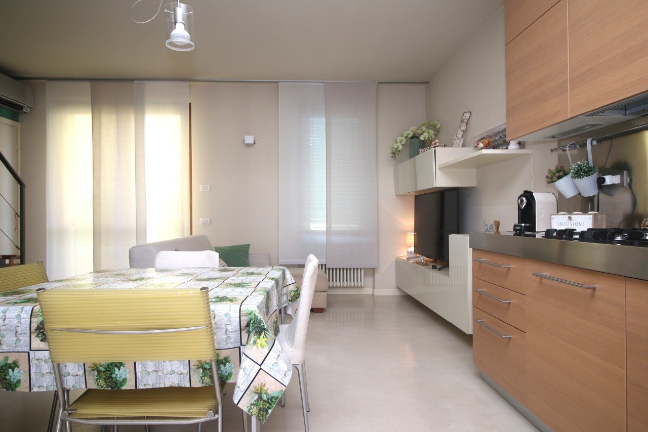 Zona living con cucina a vista