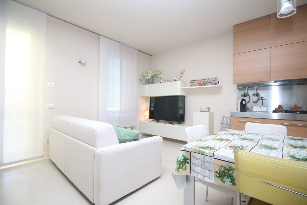 Zona living con cucina a vista