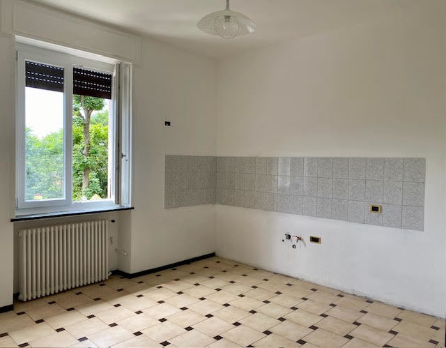 Zona giorno con cucina a vista